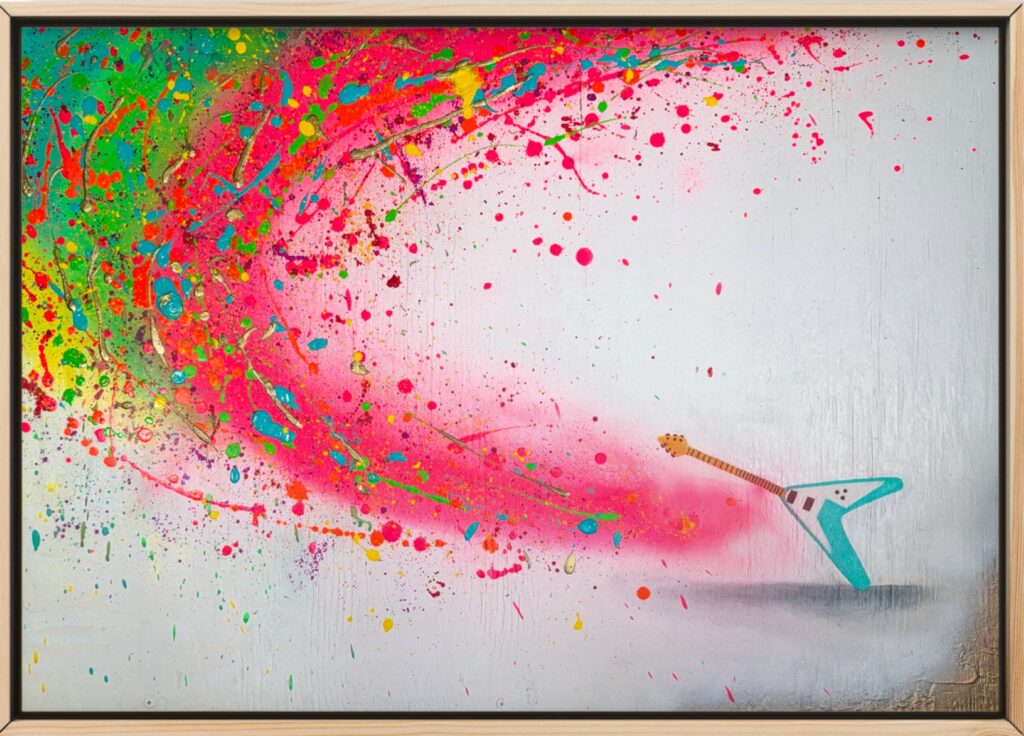VISUAL RHYTHMS: "GIBSON FLYING V” is a vibrant, abstract interpretation inspired by the iconic Gibson Flying V electric guitar, most famously associated with Jimi Hendrix. The artwork is rendered in acrylic, oil, and spray paint on a wooden panel. At the center of the composition, the unmistakable V-shaped silhouette of the Gibson Flying V guitar emerges, stylized and fragmented into bold, geometric forms. The guitar’s angular body is accentuated by dynamic strokes and contrasting colors, evoking a sense of movement and musical energy. Surrounding the guitar, rhythmic patterns and layered textures pulse outward, suggesting sound waves or the visual energy of rock music.